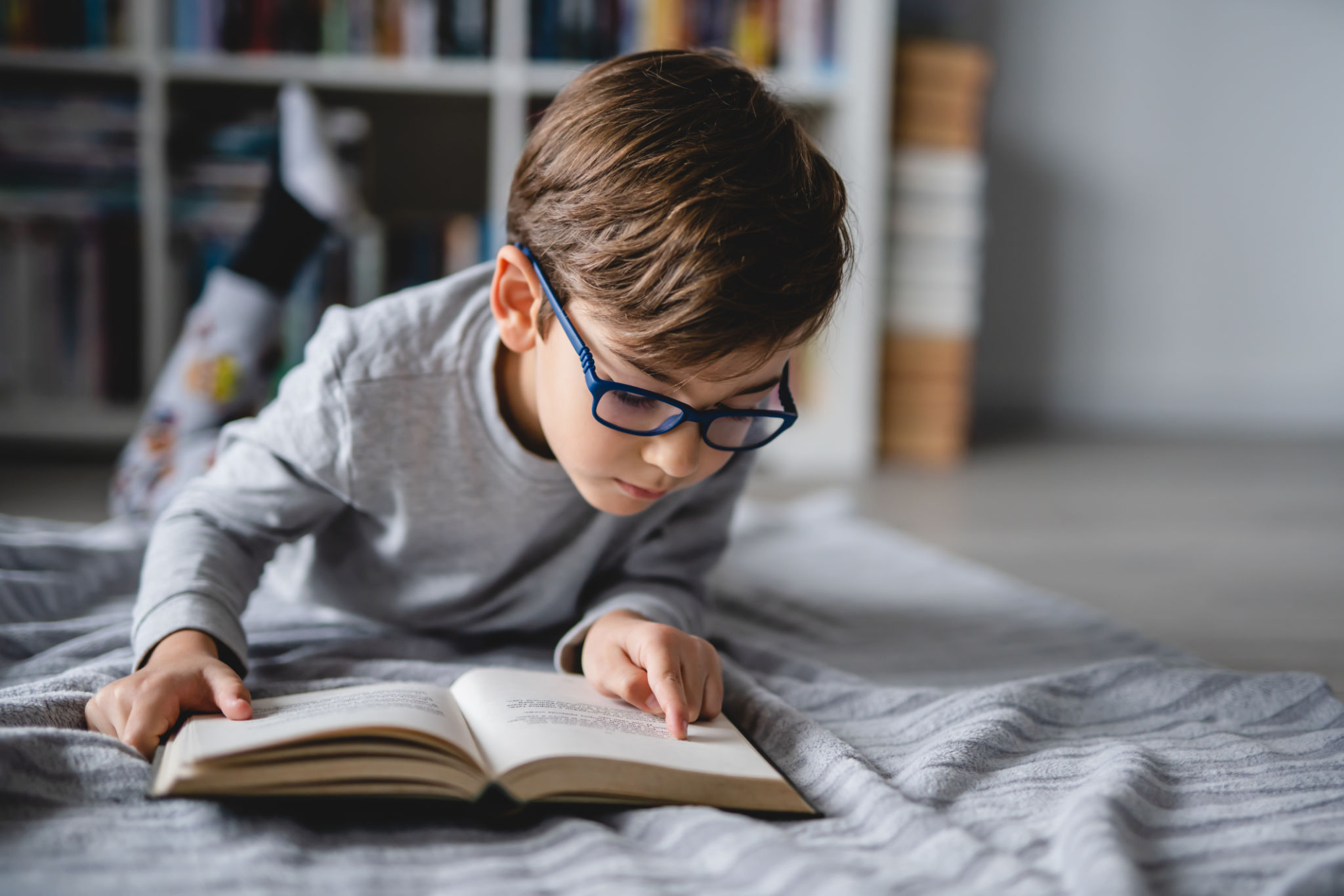child reading at home
