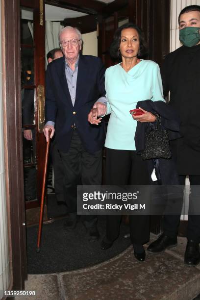 Michael Caine and Shakira Caine are seen on a night out at Langan's Brasserie in Mayfair on December 15, 2021 in London, England.