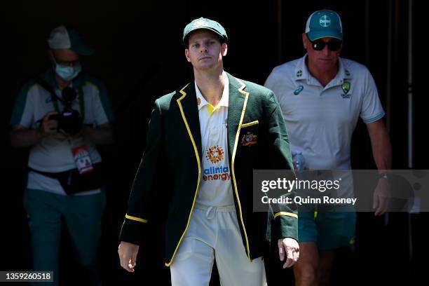 Australian captain Steve Smith walks onto the field for the coin toss ahead of day one of the Second Test match in the Ashes series between Australia...