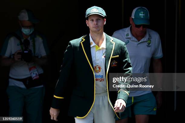 Australian captain Steve Smith walks onto the field for the coin toss ahead of day one of the Second Test match in the Ashes series between Australia...