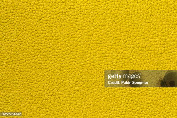 yellow leather and texture background. - car wrapping foto e immagini stock