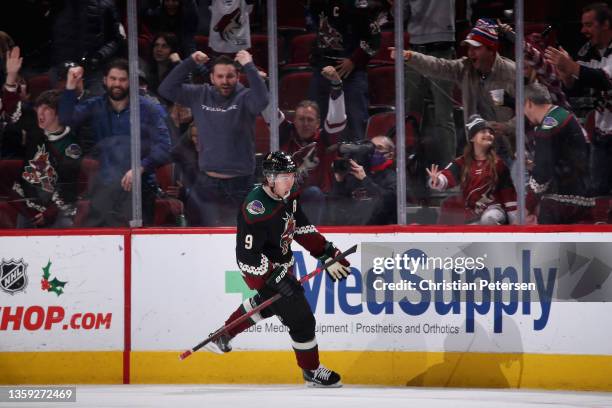 Clayton Keller of the Arizona Coyotes celebrates after scoring a power-play goal against the New York Rangers during the third period of the NHL game...