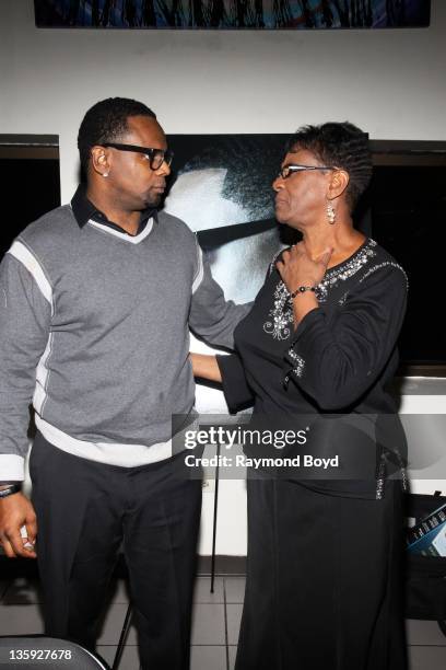 Singer Carl Thomas shares a moment with his mother Dorothy Thomas, during "The Experience With Carl Thomas" at the DuSable Museum in Chicago,...