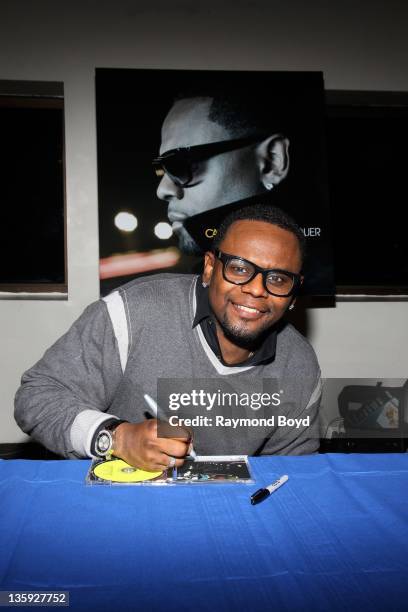 Singer Carl Thomas poses for photos during "The Experience With Carl Thomas" at the DuSable Museum in Chicago, Illinois on DECEMBER 06, 2011.