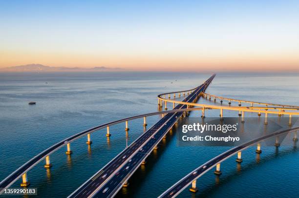 jiaozhou bay bridge of qingdao, shandong province, china - water surface line stock pictures, royalty-free photos & images