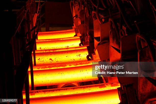 continuous casting plant at steel mill - siderurgicas fotografías e imágenes de stock