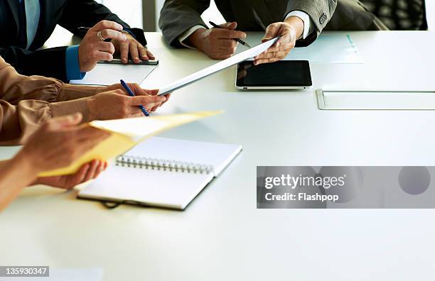 close-up of hands in business meeting - agenda meeting stockfoto's en -beelden