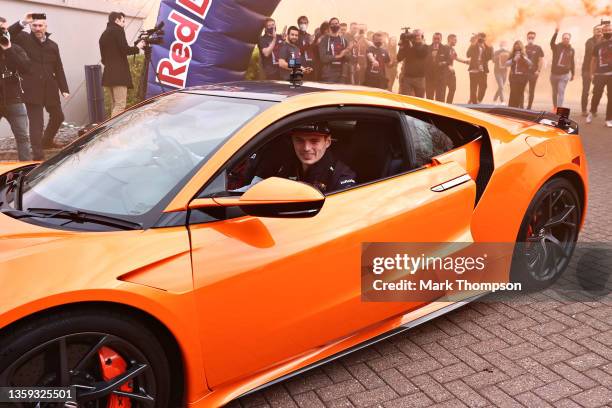 World Drivers Champion Max Verstappen of Netherlands and Red Bull Racing arrives at Red Bull Racing Factory on December 15, 2021 in Milton Keynes,...