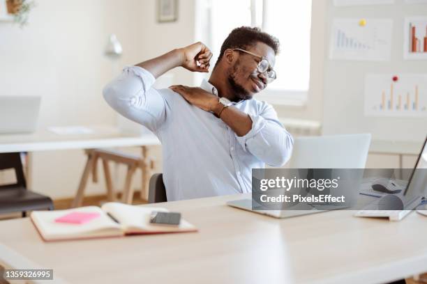 businessmen are suffering from work-related pain - posture stock pictures, royalty-free photos & images