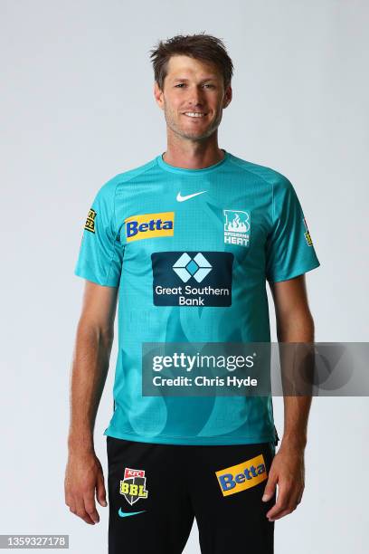 Cameron Gannon poses during the Brisbane Heat Big Bash League headshots session on December 17, 2021 in Brisbane, Australia.