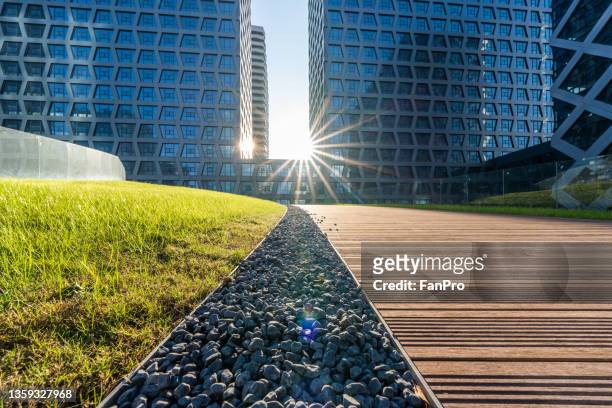 empty road with new modern office area - jiangsu province stock pictures, royalty-free photos & images