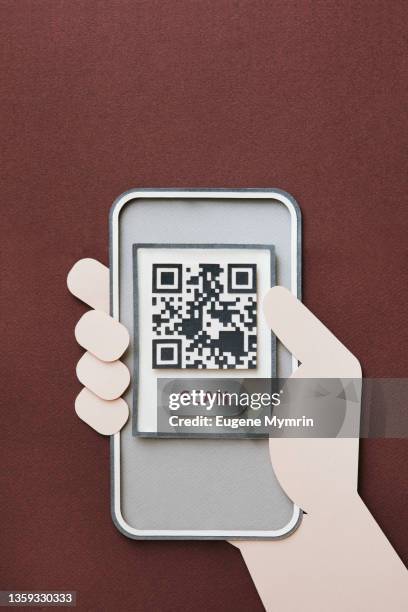 smartphone displaying a qr code - scan code stock pictures, royalty-free photos & images