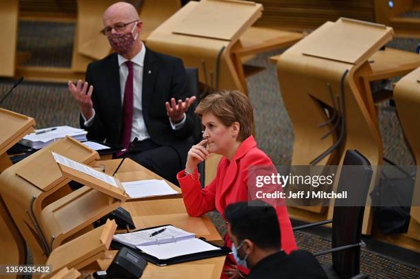 Scotland's First Minister Nicola Sturgeon attends First Minster's Questions at the Scottish Parliament on December 16, 2021 in Edinburgh, Scotland....