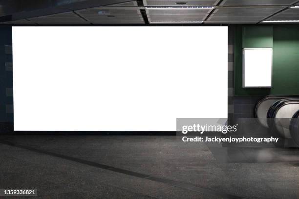 blank billboard at subway station - subway station poster stock pictures, royalty-free photos & images