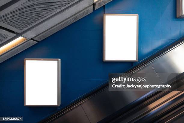 blank billboard at subway station - subway station poster stock pictures, royalty-free photos & images