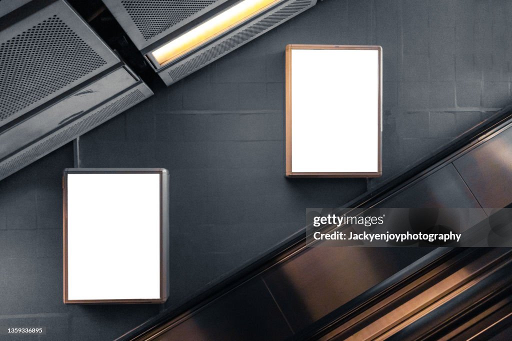 Blank billboard at subway station