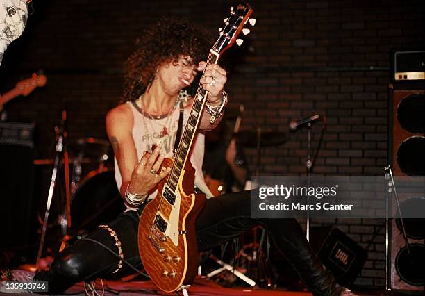 Slash of the rock group 'Guns n' Roses' performs onstage on the night they played "Paradise City" for the first time at the Troubadour on October 10,...