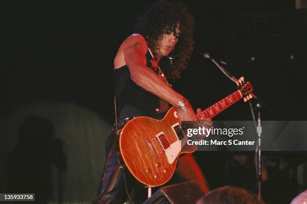 Slash of the rock group 'Guns n' Roses' performs onstage at the Country Club on October 18, 1985 in Reseda, California.