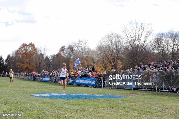 Alex Phillip of John Carroll won the individual championship, winning the 8K race with a time of 23:27.6 at the Division III Men's and Women's Cross...
