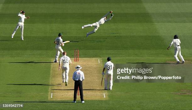 Jos Buttler of England drops a chance from the bat of Marnus Labuschagne of Australia during day one of the Second Test match in the Ashes series...