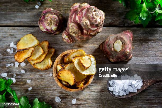 topinambur - jerusalem artichoke. homemade chips - jerusalem artichoke stock pictures, royalty-free photos & images