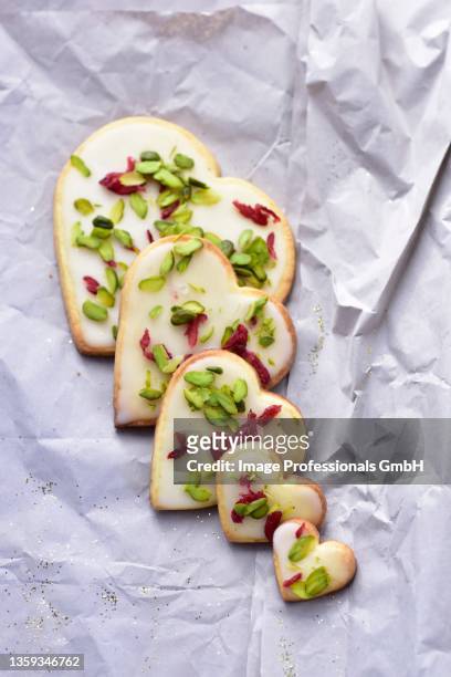 cranberry and lemon cookies with pistachios - cranberry heart stock pictures, royalty-free photos & images