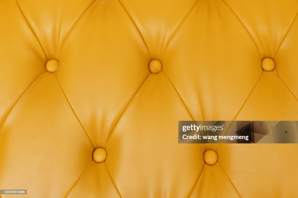 Diamond lattice on the surface of yellow sofa