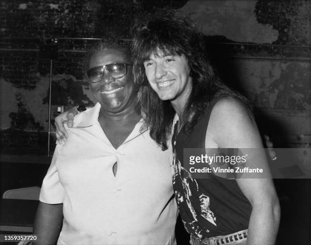 American singer-songwriter and guitarist BB King and American guitarist and songwriter Richie Sambora, who has his arm around King, circa 1985.