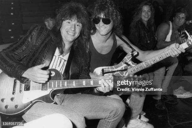American guitarist and songwriter Richie Sambora and American guitarist and songwriter Eddie Van Halen attend the all-star tribute to Les Paul, held...