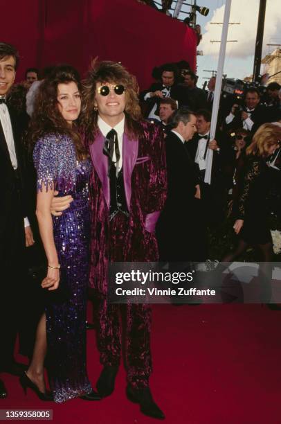 American singer, songwriter and guitarist Jon Bon Jovi and his wife, Dorothea Hurley attend the 63rd Academy Awards, held at the Shrine Auditorium in...