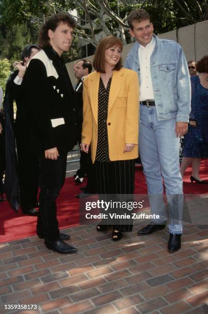 American singer and musician Darryl Ellis, American singer and songwriter Suzy Bogguss, and American singer and musician Don Ellis attend the 29th...