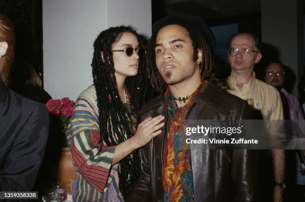 American actress Lisa Bonet , wearing sunglasses, and American singer-songwriter and musician Lenny Kravitz, wearing a brown leather jacket and a...