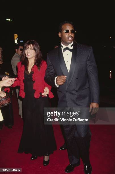 American baseball player Barry Bonds and his wife, Swedish makeup artist Sun Bonds attend the 15th Annual CableACE Awards, held at Pantages Theater...