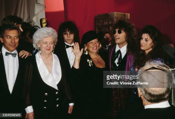 American singer, songwriter and guitarist Jon Bon Jovi and his wife, Dorothea Hurley with people attend the 63rd Academy Awards, held at the Shrine...