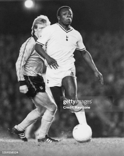 Garth Crooks, Forward for Tottenham Hotspur Football Club runs the football upfield during the FA Cup Semi-final match against Wolverhampton...