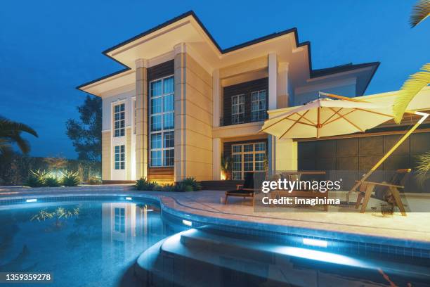 modernes luxushaus mit privatem pool in dawn - luxury home exterior stock-fotos und bilder