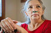 Senior woman receiving oxygen
