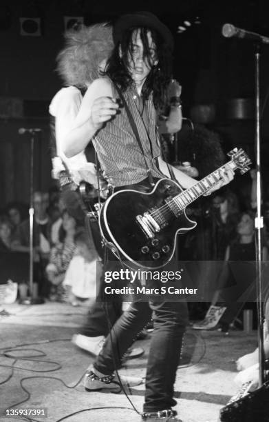 Izzy Stradlin of the rock band "Guns n' Roses" performs onstage at the Troubadour where they played "Rocket Queen" for the first time on September...