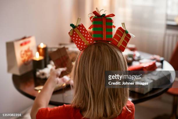 rear view of boy wearing christmas headband - johner christmas bildbanksfoton och bilder