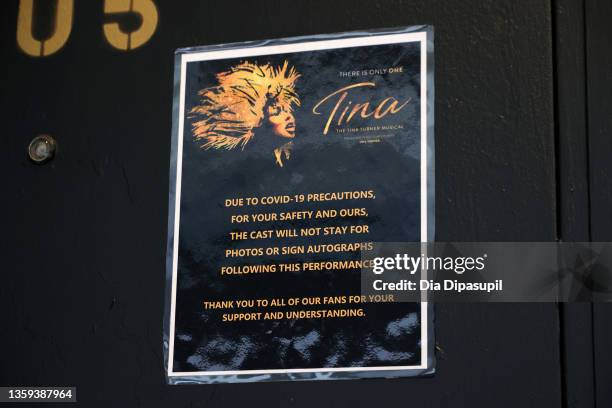 Covid sign hangs on the stage door of "Tina: The Tina Turner Musical" at the Lunt-Fontanne Theatre on December 16, 2021 in New York City. Several...