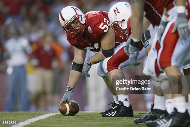 Center John Garrison of the Nebraska Cornhuskers flexes over the line of scrimmage during the NCAA football game against the Arizona State Sun Devils...