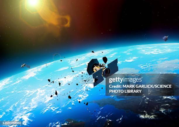dangers of low-earth orbit - orbiting foto e immagini stock