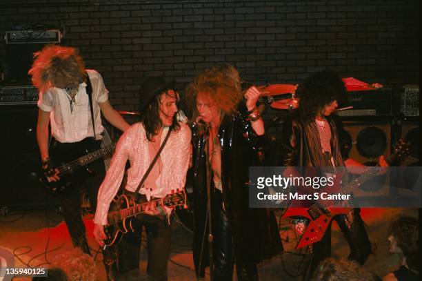Duff McKagan, Izzy Stradlin, Axl Rose and Slash the rock band "Guns n' Roses" perform onstage at the Troubadour on July 20, 1985 where they performed...