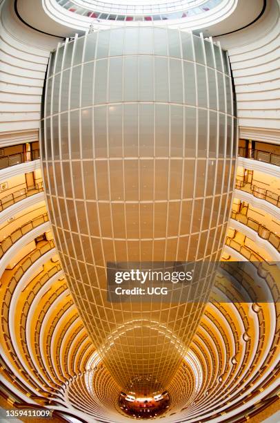 The central atrium of the Jin Mao Tower Grand Hyatt Hotel seen from above, Pudong, Shanghai, China.