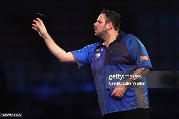 Adrian Lewis of England in action during their Second Round match against Gary Anderson of Scotland during the William Hill World Darts Championship...