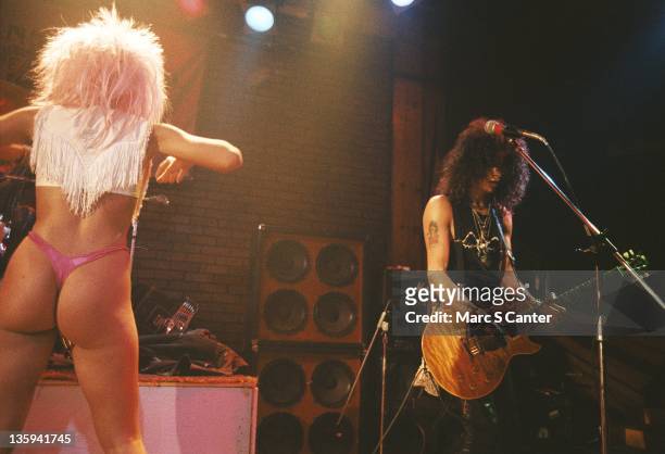 Slash of the rock band 'Guns n' Roses' performs onstage at the Troubadour where they played the song 'My Michelle' for the first time to a sold out...