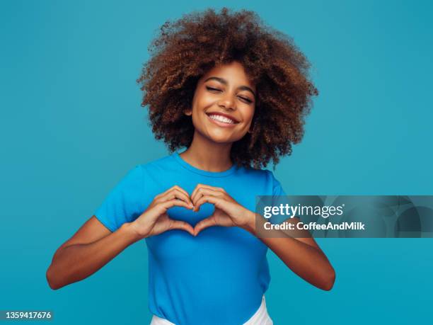 beautiful afro woman - curly hair stock pictures, royalty-free photos & images