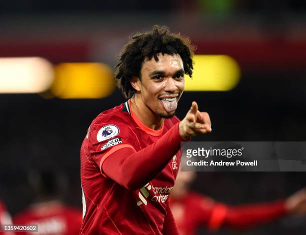 Trent Alexander-Arnold of Liverpool celebrates after scoring the third goal during the Premier League match between Liverpool and Newcastle United at...