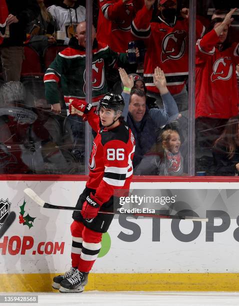 Jack Hughes of the New Jersey Devils celebrates his goal during the first period against the Vegas Golden Knights at Prudential Center on December...