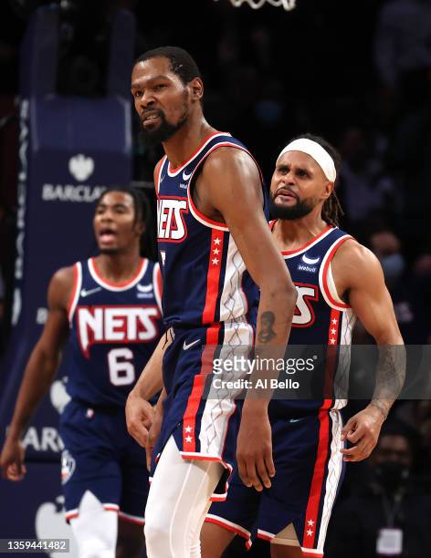 Kevin Durant of the Brooklyn Nets celebrates a shot against the Philadelphia 76ers during their game at Barclays Center on December 16, 2021 in New...